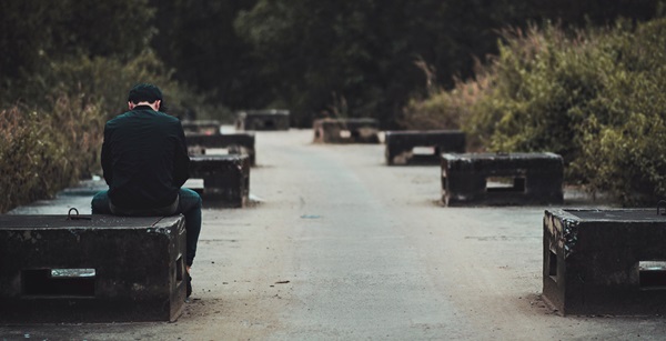 man-sitting-alone