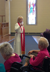 The Rev. Kristen J. Larsen, senior pastor, leads a Worship for the Soul service.