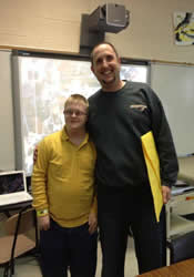 Home Missioner Scott Vickery poses with one of his students at Oak Grove High School in Hattiesburg, Miss., where he was a special education teacher until January 2013.
