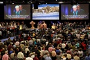 Delegates and visitors fill the plenary hall in the May 1 afternoon celebration of Pan-Methodist Full Communion at the 2012 United Methodist General Conference in Tampa, Fla.  On the screen are Bishop Sharon Rader and Bishop John White.  