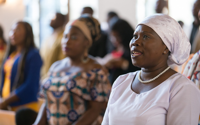 Ghanaian migrants sing during worship at Ebenezer United Methodist Church in Hamburg, Germany. Photo by Mike DuBose. UMNS. December 2017.