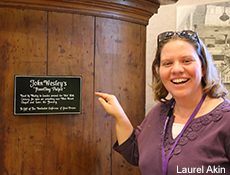 United Methodist History class member Logan Alley with John Wesley's traveling pulpit at the World Methodist Museum at Lake Junaluska. Photo courtesy of Laurel Akin