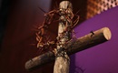 Display featuring a crown of thorns and cross with purple cloth heralds the beginning of Lent. File photo by Kathleen Barry, United Methodist Communications.