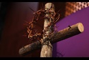 Display featuring a crown of thorns and cross with purple cloth heralds the beginning of Lent. File photo by Kathleen Barry, United Methodist Communications.