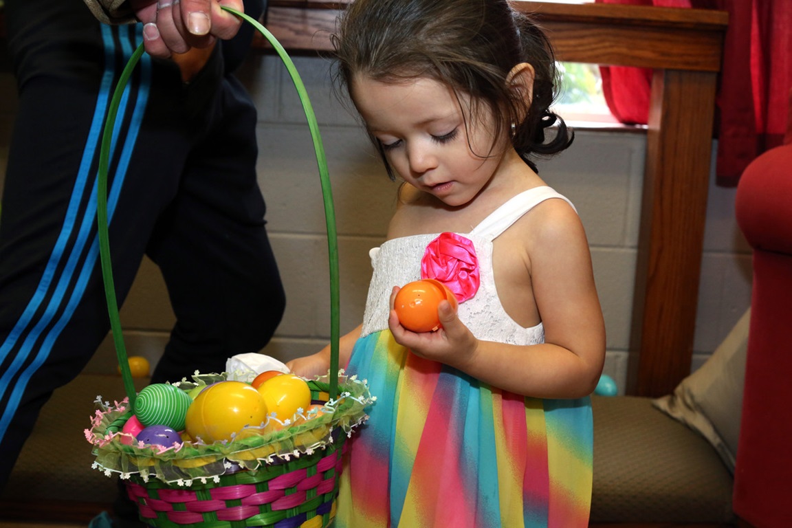  A toddler and her friend enjoy the 2016 Easter Egg Hunt at Hillcrest United Methodist Church in Nashville, Tenn. Activites at home during Holy Week can prepare youngsters as well as adults, to more fully experience the joy of Easter.