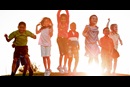 Children playing with sunset in background. Image courtesy of Discipleship Ministries.