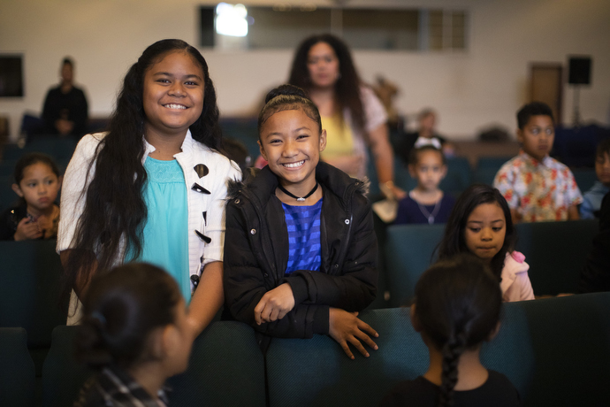 Smiles of welcome are visible everywhere, even for visitors, during the Sunday service at the Tongan United Methodist Church.  