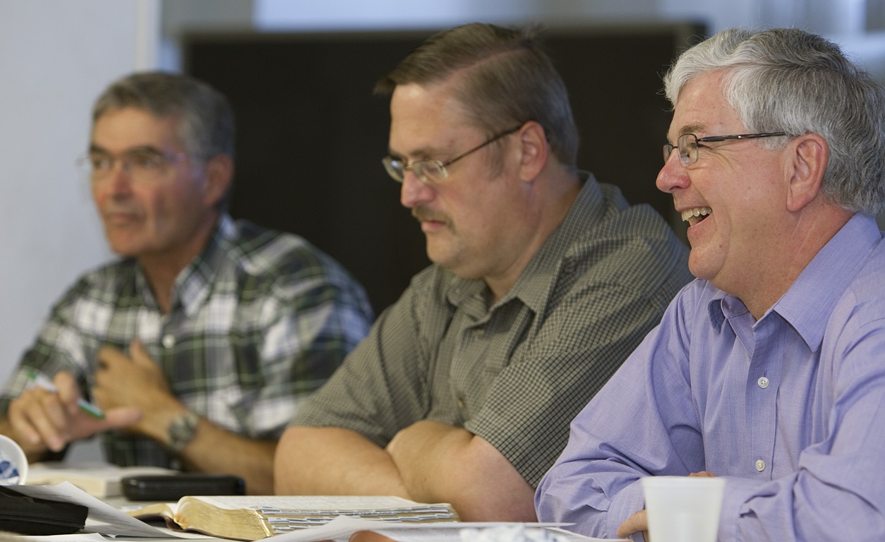 The Rev. Bill Patterson (right) helps lead a men's Bible study at Leipsic (Ohio) United Methodist Church. At left are Ken Rider and Craig Wykoff. Photo by Mike DuBose, UMNS.