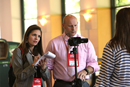 South Carolina communicators, Jessica and Matt Brodie, interview Elizabeth Murray, a page and marshall during the 2016 United Methodist General Conference in Portland, Ore. Photo by Kathleen Barry, UMNS..