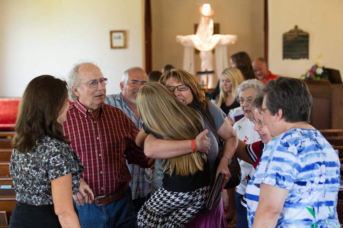 Pastor Laura Vincent hugs Hailey Embrey, 8, following worship at Shiloh United Methodist Church near Clinton, Ky. Photo by Mike DuBose, UMNS.
