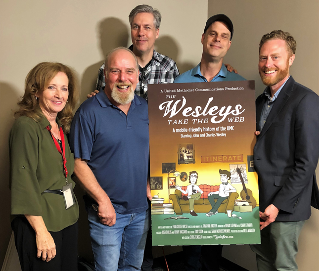 The team that created "The Wesleys Take the Web"  gathered at United Methodist Communications in June 2018. Front row (left to right): Fran Coode Walsh, script writer and producer; Henry Haggard, voice of John Wesley; the Rev. Charlie Baber, creator of the WesleyBros.com characters. Back row (left to right): Josh Childs, voice of Charles Wesley; Jonathan Richter, animator.