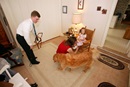  The Pridmore family prepares for church at their parsonage in Rolling Fork, Miss., where the Revs. Eric and Lisa Pridmore pastor a three-point charge. Lisa helps their daughter Mary Ruth with her shoes while Eric and Gene, his Seeing Eye dog, get ready to go. Photo by Mike DuBose, UMNS 