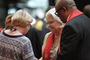 Bishop W. Earl Bledsoe prays with a small group at General Conference 2016 in this file photo.
