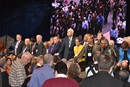 Bishops pray with delegates during the last day of the Special Session of the General Conference Tuesday in St. Louis.