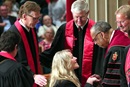 	The Rev. Tiffany Nagel Monroe (center) rises with the help of Bishop Robert E. Hayes Jr. after she was ordained elder in the Oklahoma Conference June 1, 2016, at St. Luke's United Methodist Church in Oklahoma City. Monroe and her father, Alan Nagel, both were ordained elder during the service, having graduated in the same class at Saint Paul School of Theology. Photo by Hugh W. Scott, Oklahoma Conference.