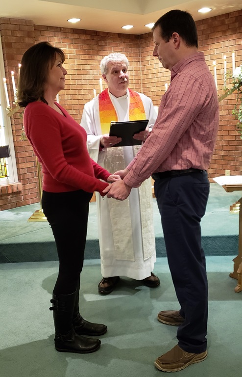 Dennis and Shelly Kelley renewing their marriage vows at First UMC in Columbus, Indiana with the Rev. Howard Boles officiating. Courtesy of First UMC. 2019.