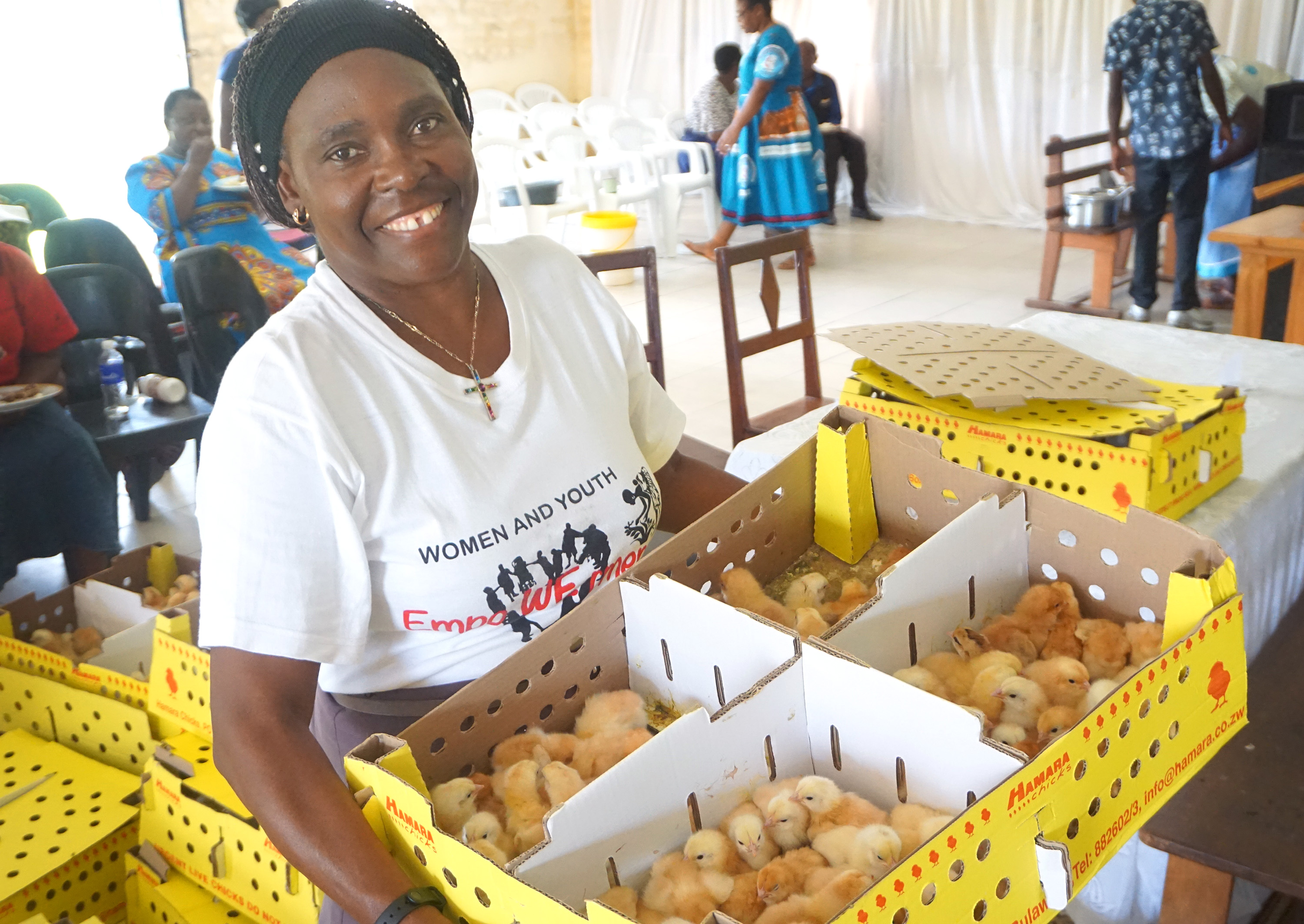 Tendai Rebecca Gurupira, area coordinator for The United Methodist Church’s Ministry of Women, Youth and Children, holds a box with 100 chicks to be given out to women and girls in the drought-prone Masvingo District in Zimbabwe. The farming project is funded by an $8,000 grant from United Methodist Women. Photo by Kudzai Chingwe, UM News.