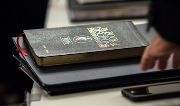 A copy of Bishop Bruce R. Ough's Book of Discipline rests on a table during an oral hearing on May 22 in Evanston, Ill. The United Methodist Judicial Council, the denomination’s top court, heard arguments regarding a request from the Council of Bishops for a ruling on whether United Methodist organizations, clergy or lay members can submit petitions for the special General Conference in 2019. The hearing was part of the court’s May 22-25 special session. Photo by Kathleen Barry, UM News.
