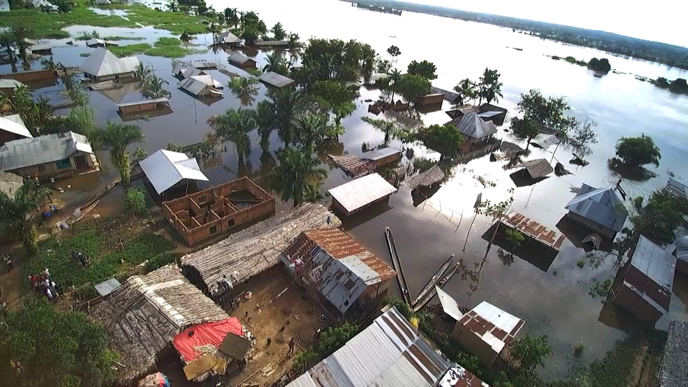 An aerial view of houses engulfed by water in Kindu, Congo. Torrential rains caused the Congo River to overflow in April, affecting more than 10,000 households in Kindu. Photo by Chadrack Tambwe Londe, UM News. 