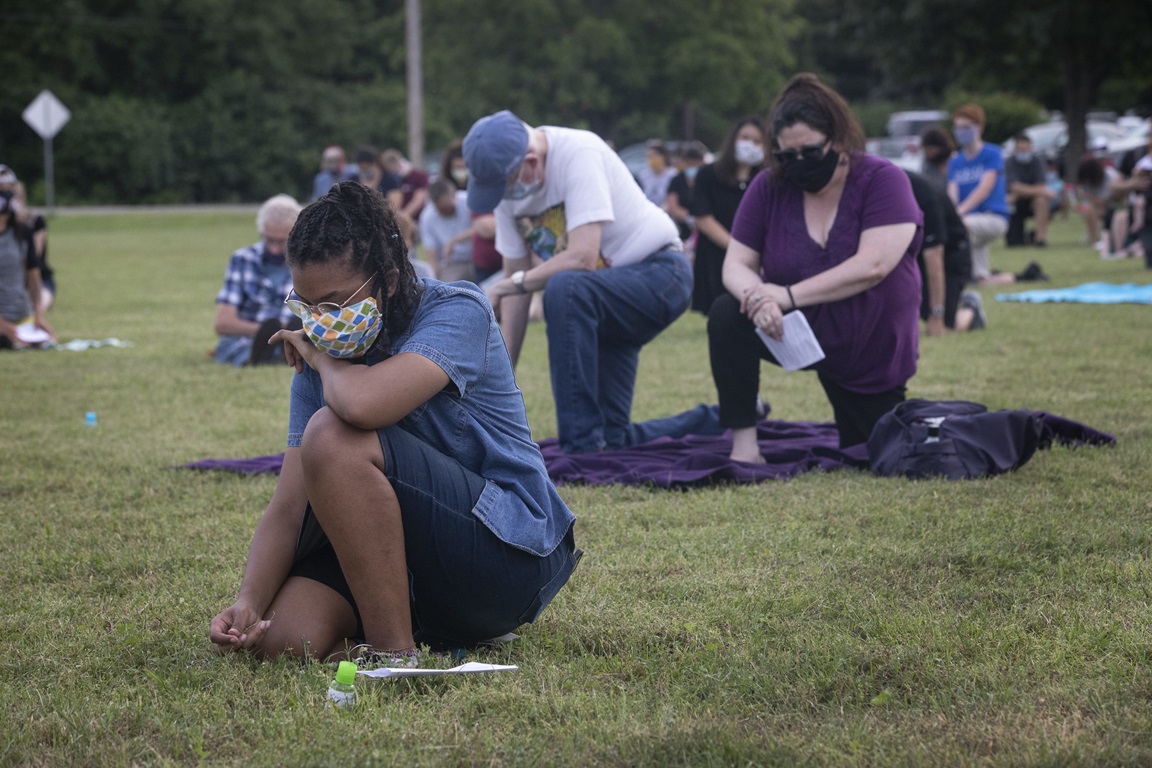 Maya Cunningham, 16, and others kneel in silence for 8 minutes in honor of George Floyd during an ecumenical prayer service on June 5, 2020 at Belle Meade United Methodist Church in Nashville, Tenn. Cunningham is from First United Pentecostal Church in Nashville. Photo by Kathleen Barry, UM News.