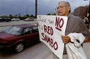 In this file photo, the Rev. Homer Noley, a United Methodist from Wilburton, Okla., joins other members of his denomination in protesting outside a May 11, 2000, Cleveland Indians baseball game held during The United Methodist General Conference. Rev. Noley died in 2018. Photo by Paul Jeffrey, UM News.