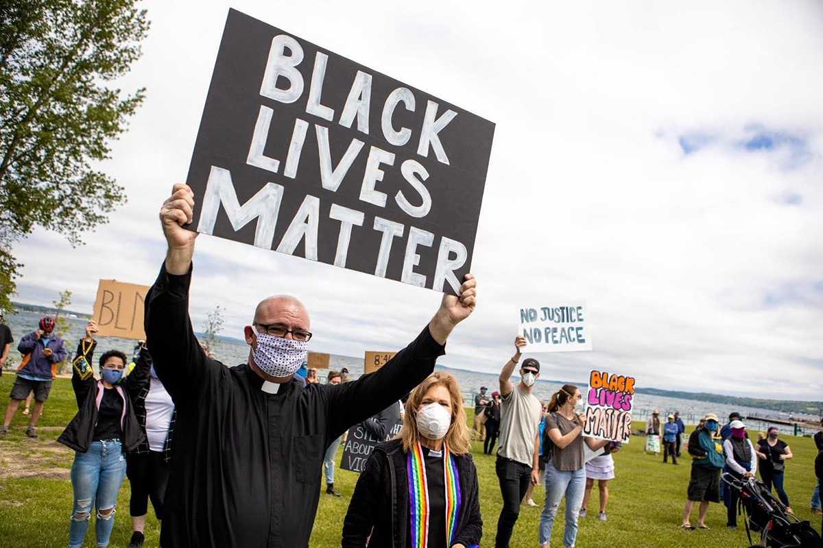 The Rev. Jeremy Wicks (front) takes part in a Black Lives Matter demonstration in northern Michigan. Wicks has served as a police chaplain, a reserve police officer and a Black Lives Matter organizer. Photo courtesy of the Rev. Jeremy Wicks.