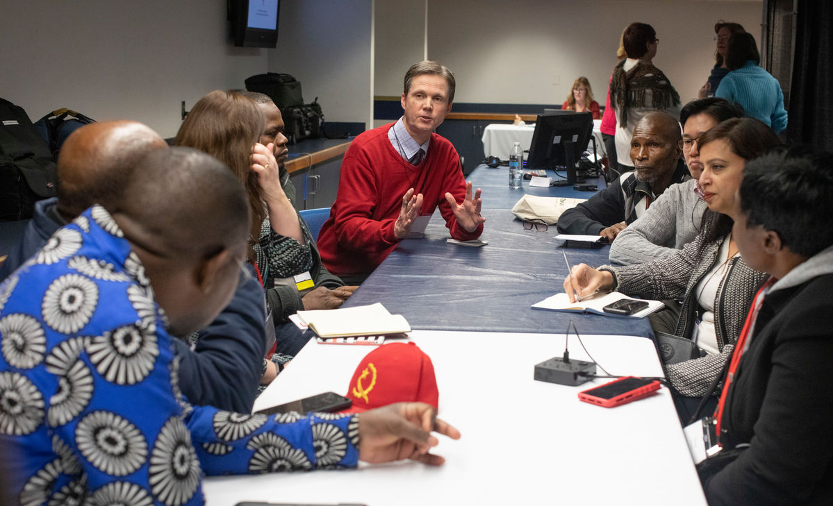 	Tim Tanton, chief news and information officer for United Methodist Communications, shares updates with African communicators during the 2019 United Methodist General Conference in St. Louis. Directors of UMCom met to listen to concerns and share information. (Photo by Kathleen Barry, UM News)