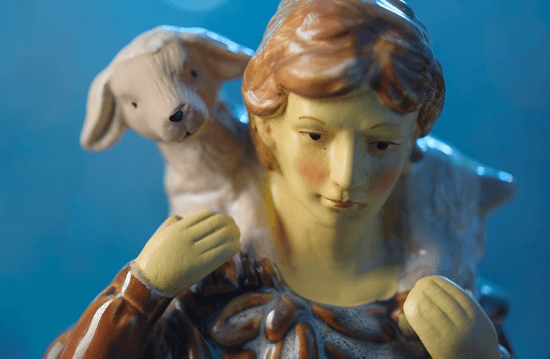 Nativity set figurine of a shepherd holding a lamb while looking for the Christ child. Courtesy of the Lewis Center for Church Leadership.