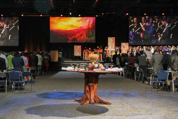 Worshipers rise at the opening celebration for the United Methodist 2016 General Conference in Portland, Ore. (Photo by Maile Bradfield, UMNS.)