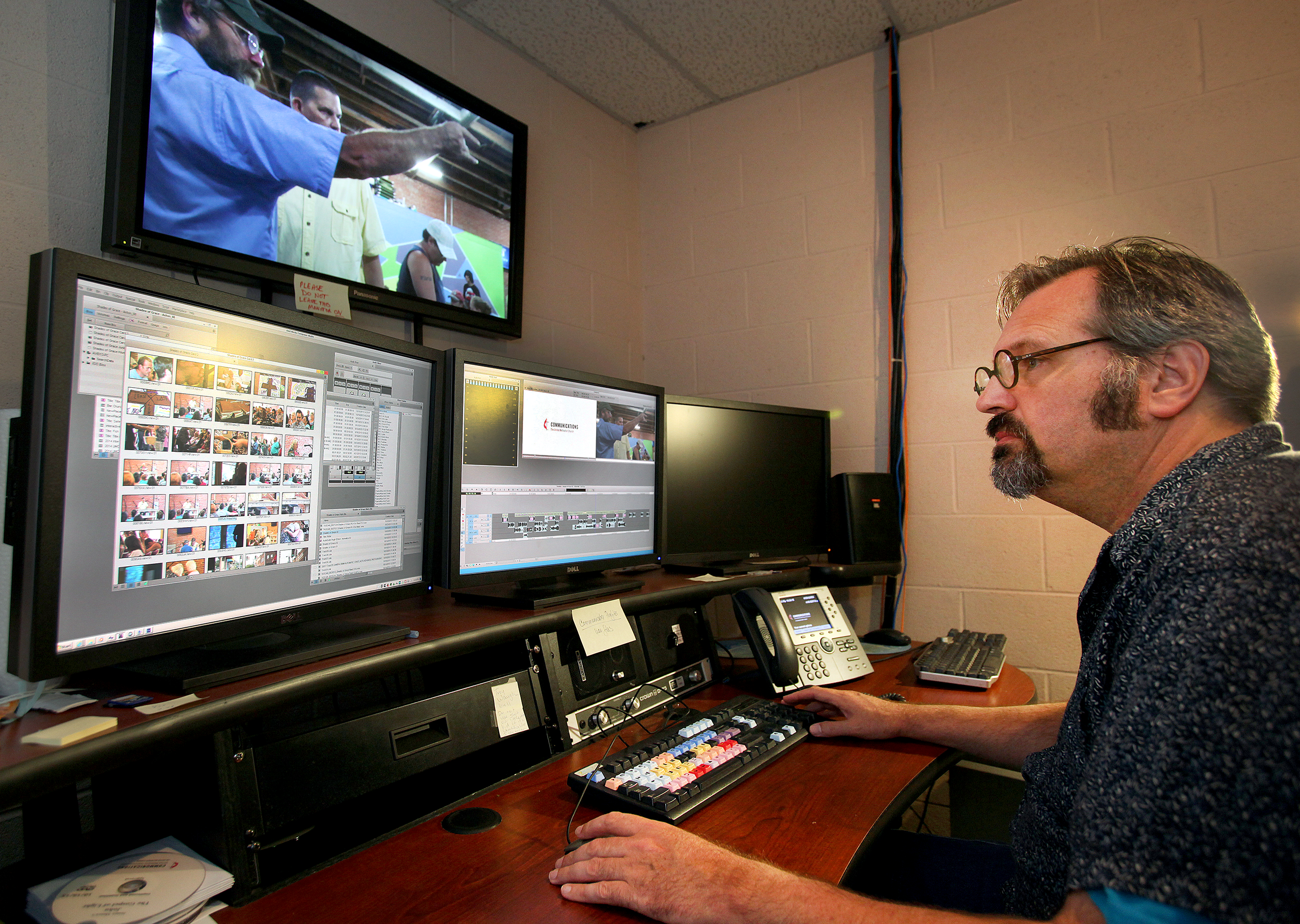 Contract editor Tony Cook works on a video project at United Methodist Communications in one of our state-of-the-art video editing suites. Photo by Kathleen Barry, United Methodist Communications.