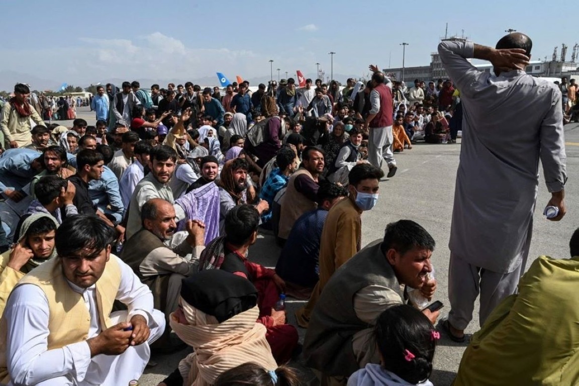 Afghans at the Kabul airport on August 18, 2021. PHOTO: SHUTTERSTOCK