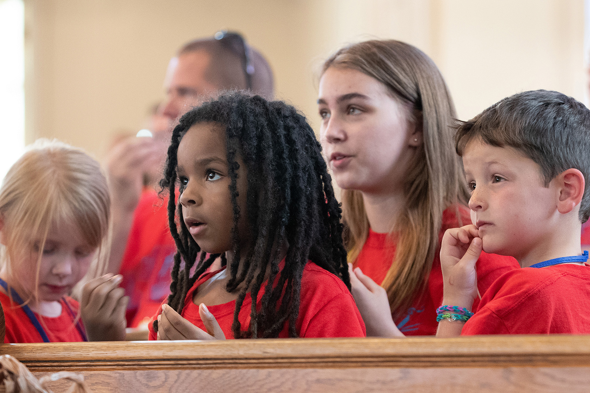 Children listen to a lesson during vacation Bible school at Connell Memorial United Methodist Church in Goodlettsville, Tenn. From left are: Abby Hartmann, Emma Furtado, Emme Sinclair Krueger and Barrett Christian. Photo by Mike DuBose, UM News.