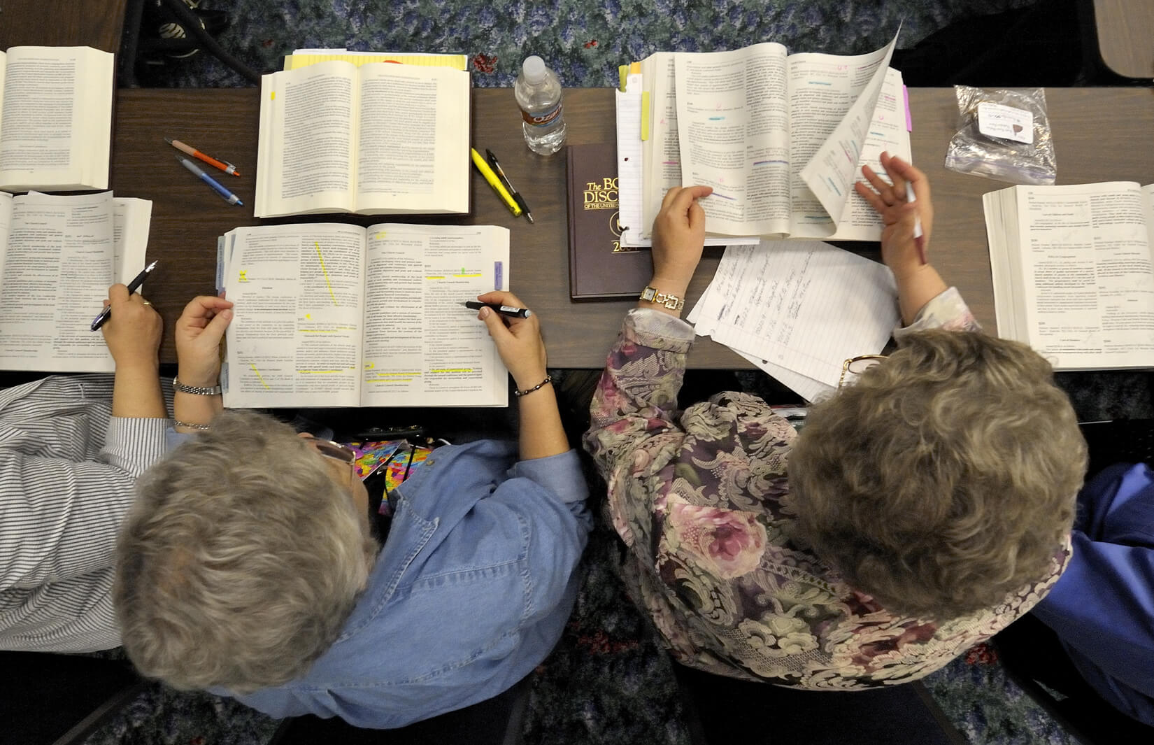 Papers are plentiful in legislative committee sessions at the 2008 United Methodist General Conference on April 25. The quadrennial gathering is being held in Fort Worth, Texas. A UMNS photo by Paul Jeffrey