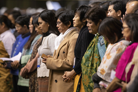 Delegates from the Philippines and Southeast Asia pray during a day of prayer at the 2019 United Methodist General Conference in St. Louis.. Photo by Kathleen Barry, UMNS.