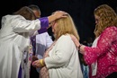 Lori Sluder is consecrated a deaconess by Bishop Karen Oliveto on April 29 during the United Methodist General Conference in Charlotte, N.C. Assisting her is Megan Hale (right), the executive for the Candidacy Office of Deaconess and Home Missioner of United Women in Faith. Sluder serves as executive assistant to the bishop of the Holston Conference. Photo by Paul Jeffrey, UM News.