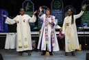 Following the consecration of deaconesses on April 29, United Methodist Bishops Robin Dease (left), Karen Oliveto, and Kennetha Bigham-Tsai lead singing of participants in the United Methodist General Conference in Charlotte, N.C. Photo by Paul Jeffrey, UM News.