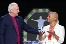 COB President Bishop Bickerton passes the gavel to  Bishop Tracy Smith Malone during the 2024 United Methodist General Conference in Charlotte, N.C. Tuesday April 30, 2024.  Photo by Larry McCormack, UM News.