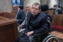 Powell Richardson and his family sit in a special row in the sanctuary of Church Street United Methodist in Knoxville, Tenn. Church Street recently added designated spaces to better accommodate persons in wheelchairs. Photo from video by Lilla Marigza, UM News.