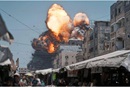 Multiple building explosions erupt during an Israeli bombing airstrike in Gaza City, Sunday, June 1, 2025. (Associated Press Photo/Jehad Alshrafi)