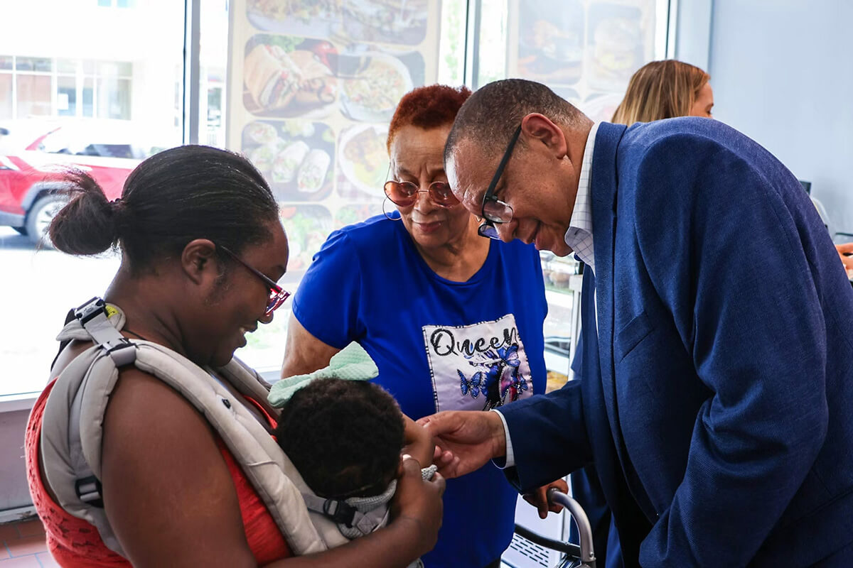 The Rev. Dale Caldwell greets a family on the campaign trail in Burlington, N.J. Caldwell, a United Methodist pastor, becomes New Jersey’s lieutenant governor and secretary of state on Jan. 20. Photo courtesy of the Mikie Sherrill for Governor Campaign.