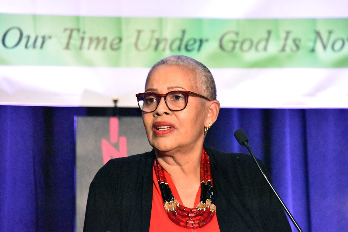 Deborah Bass opens the 59th General Meeting of Black Methodists for Church Renewal in Charlotte, N.C., on March 18, with her national chairperson’s address. She urged members of the caucus to fight injustice with faith, compassion and courage. Photo by John W. Coleman, UM News. 