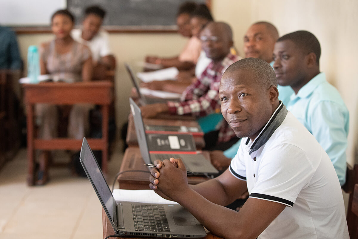 Students attend a class at the Cambine Theological Seminary, part of the United Methodist Cambine Mission near Macarringue, Mozambique. Through the Miracle Sunday offering on May 17, United Methodists have the chance to help support scholarships for students at Cambine and other United Methodist-related theological schools in Africa, Europe and the Philippines.  File photo by Mike DuBose, UM News. 