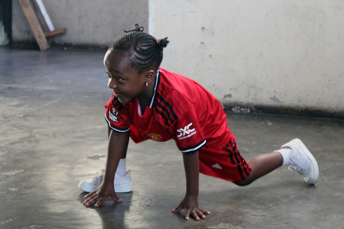Five-year-old Crystal Buta participates in a Zumba class at Chisipiti United Methodist Church in Harare, Zimbabwe. The women’s organization at Chisipiti launched the all-ages dance classes to foster community and combat rising stress and anxiety. Photo by Kudzai Chingwe, UM News.