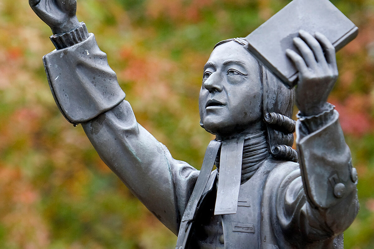 A statue of John Wesley, the founder of Methodism, stands in the center of campus at Asbury Theological Seminary in Wilmore, Ky. The United Methodist Church’s University Senate has decided to no longer list Asbury and Northeastern Seminary in Rochester, N.Y., as approved theological schools for preparing United Methodist pastors. Photo by Mike DuBose, UM News.