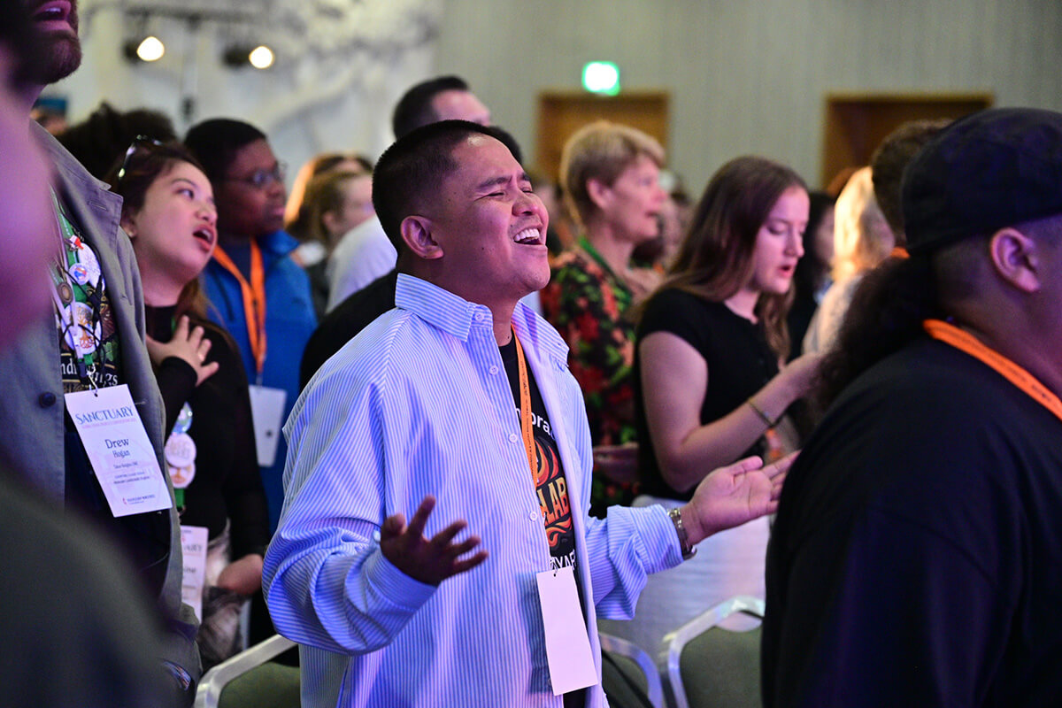 Jesse Aaron Felicitas of Antagan United Methodist Church in Isabela, Philippines, sings during worship at the Global Young People’s Convocation, held July 7-11 in Dublin, Ireland. About 600 youth and young adults gathered at the quadrennial forum to deepen United Methodist connectionalism among new generations. Photo by the Rev. M. Scott Hughes, Discipleship Ministries.