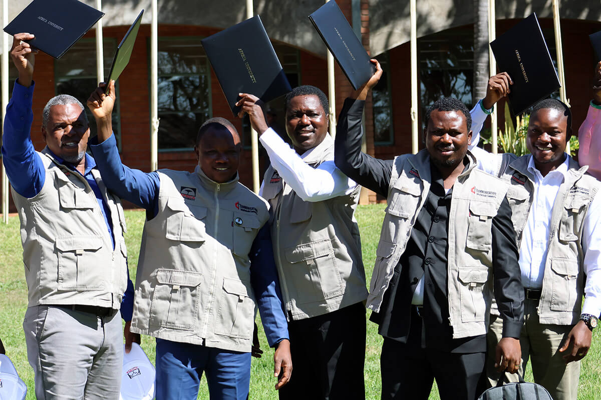 (From left) Francisco Tivane, the Rev. Filibus Bakari Auta, Ibada Hussaini, Fiston Lutuku Okito and Lebon Okito display their certificates following strategic communications training at Africa University in Mutare, Zimbabwe. The communicators say they will use their enhanced skills to guide their African communities through the challenges of conflict and epidemics. Photo courtesy of Africa University.