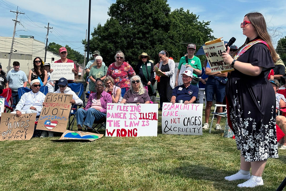 The Rev. Emily Kvalheim speaks on May 30 outside the Butler County Jail in Hamilton, Ohio, during a protest to draw attention to people being detained because of their immigration status. Kvalheim is a provisional deacon in the West Ohio Conference and a member of the Task Force on United Methodist Immigration Ministries of Ohio. Photo courtesy of the Rev. Emily Kvalheim.