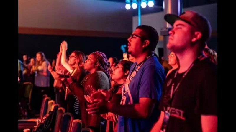 Participants gather for opening night worship at EXPLORATION 2019, joining in music, prayer and reflection as they begin a shared journey of discerning God’s call. Photo by Joseph McBrayer