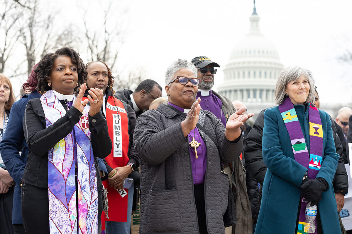 Bishop Cynthia Moore-Koikoi (from left), Bishop LaTrelle Easterling, the Rev. Erica Robinson-Johnson and other faith leaders participate in a public witness for immigrant justice near the U.S. Capitol in Washington on Feb. 25. United Methodist leaders are cheering an Oct. 20 U.S. federal appeals court ruling that allows faith groups, including United Methodists, to move forward with a lawsuit to stop a Trump administration policy that allows immigration enforcement within houses of worship. File photo by Mike DuBose, UM News.